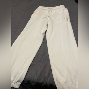 All white puma joggers